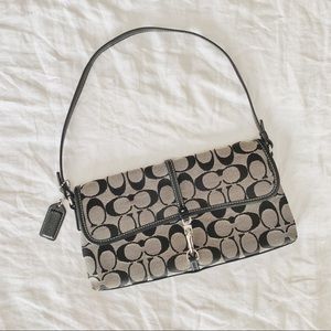 Coach signature pattern clutch
